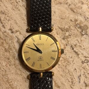 Gucci Gold Dial with Black Strap Watch